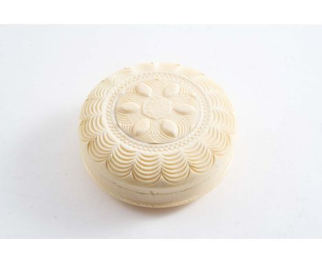 A 19TH CENTURY TURNED IVORY SNUFF BOX circular with plain sides & base, the cover with engine-turned decoration, unmarked;  2