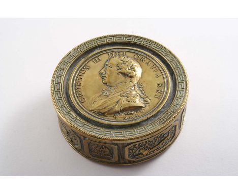 AN EARLY 19TH CENTURY STAMPED BRASS COMMEMORATIVE BOX with a portrait of King George III on the cover, the base with the text
