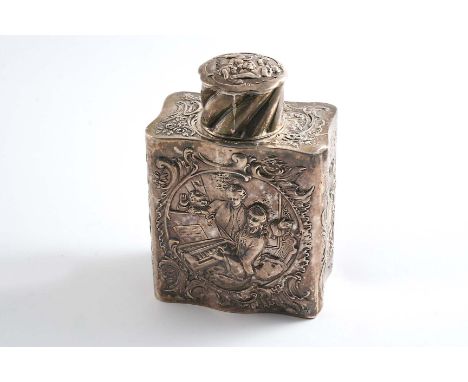 AN EARLY 20TH CENTURY GERMAN DECORATIVE TEA CADDY  with a pull-off cap, embossed & chased on one side with figures around a p