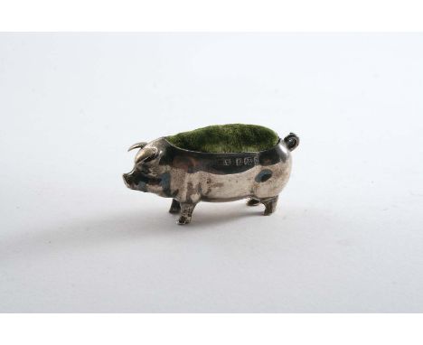 AN EDWARDIAN SMALL NOVELTY PIN CUSHION  in the form of a standing pig with a lined & stuffed back, by Levi & Salaman, Birming