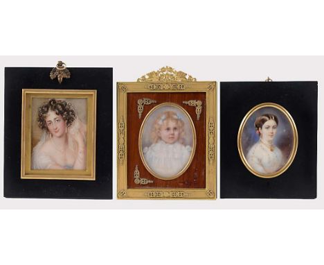 ENGLISH SCHOOL C.1910  Portrait of a child, her hair with blue ribbons, on ivory; 8.5 x 6.25 cms in Empire style frame; Engli