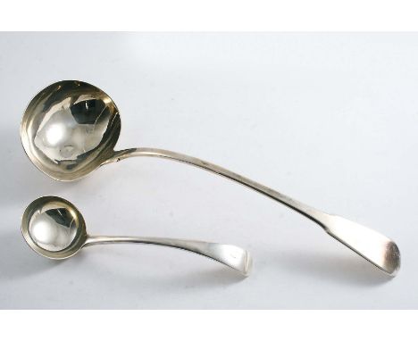 A GEORGE III FIDDLE PATTERN SOUP LADLE crested, by Thomas Barker, London 1815 and an Old English pattern sauce ladle, initial