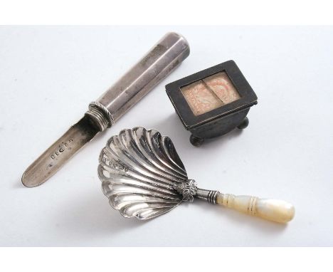 AN EDWARDIAN STAMP BOX on ball feet by Adie & Lovekin, Birmingham 1904, a Victorian caddy spoon with a turned mother of pearl