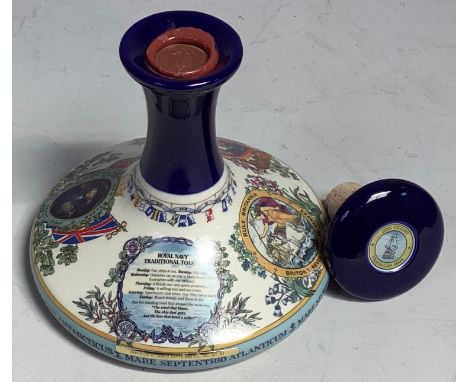A British Navy Pusser's Rum Wade ceramic decanter and stopper, wax seal intact, 1 litre, 95.5 proof 