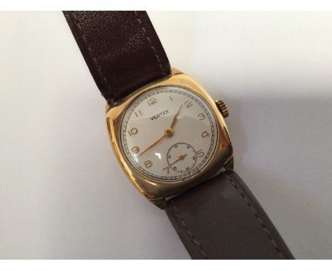 A 9ct gold cased Vertex manual wind wristwatch, the circular silvered dial with Arabic numerals denoting hours and subsidiary