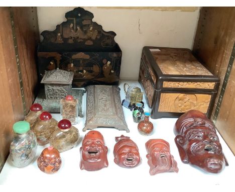 SECTION 23.  Various Oriental hardwood carved masks together with some Chinese reverse painted snuff bottles, papier mache le