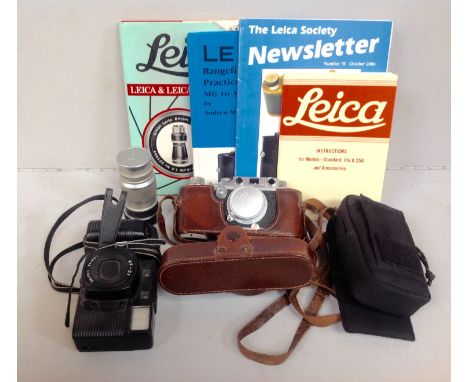 A Leica D.R.P. Ernst Leitz Wetzlar camera, No. 283336, in original brown leather case, together with a Leica AF-C1 camera and