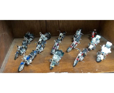 Fourteen various model motorbikes including Fat Boy Harley Davidson, State Trooper, police bikes and further Harley Davidsons