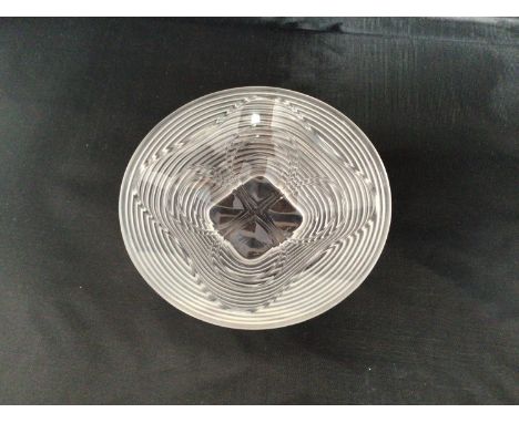A small Lalique glass dish, with stylised floral centre and frosted horizontal, reeded decoration to exterior, etched mark to