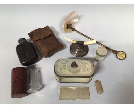 A mother of pearl panelled and white metal pill box and cover with heart shaped cartouche engraved 'MC', (af), a small silver