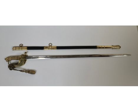 An 1827 pattern QEII Royal Naval Officers Sword with wire bound fish skin grip, lion's head pommel, gilt brass folding guard 