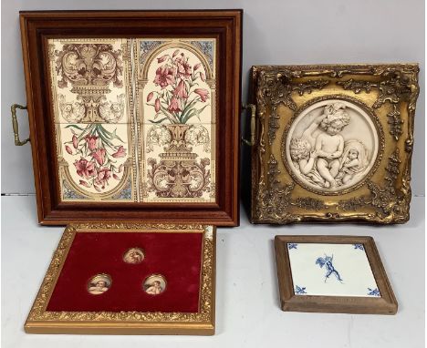 A square wooden framed tiled tray, four tiles with opposing vistas of pink flowers on pedestal bases, with twin metal handles