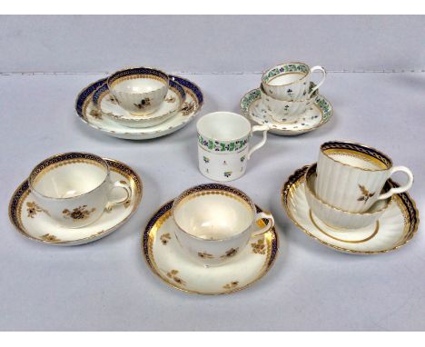 A collection of Caughley/Salopian porcelain including a pair of cups and saucers, two various trios and a matching cup, sauce