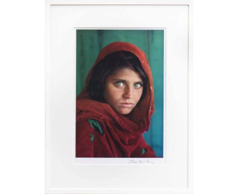 STEVE MCCURRY (AMERICAN b. 1950), SHARBAT GULA, AFGHAN GIRL, PAKISTAN offset lithographic colour print, signed lower right in