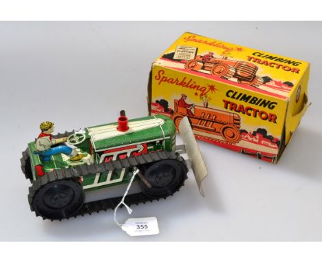 A Marx (UK) 1940s tin plate climbing tractor, with snow plough, driver and box of issue