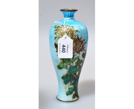 A Japanese Taisho period Ginbari cloisonne Meiping vase, decorated with chrysanthemums on a light blue ground, 19cm high