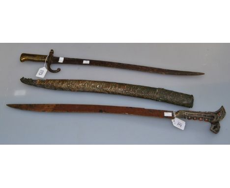 A 19th century Ottoman yatagan short sword, with butterfly hilt and hardstone decoration to the scabbard and hilt, 56.5cm, to