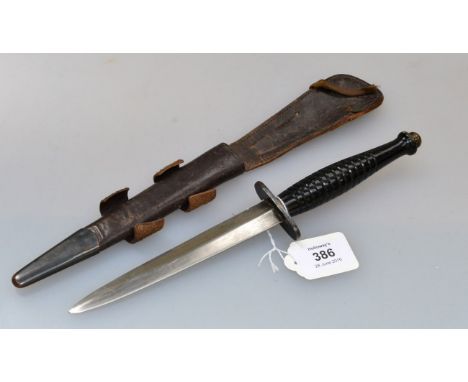 A 3rd Pattern (RAF Far East) Sykes Fairbairn fighting knife,with a turned wood grip and scabbard, 27.5cm