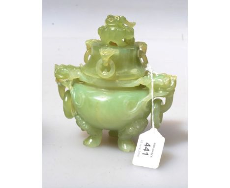 A Chinese 20th century carved celadon jade tripod censer, with dragon mounted cover and captive ring handles, 14cm wide