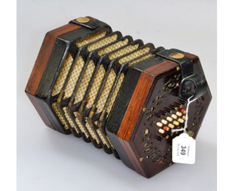 Lachenal and Co., a late 19th century forty-eight button concertina, with fret pierced rosewood end panels, in later case, 18