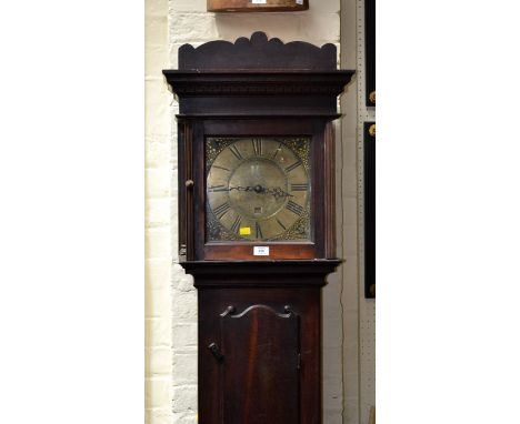 An 18th century oak 30 hour long case clock by Thomas Brown of Litchborough, with brass faced bird cage movement, the trunk w