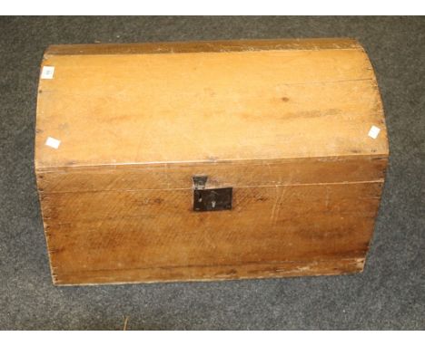 A small 19th century pine dome top trunk, the lid with Thomas Green paper label, 40 x 65.5cm