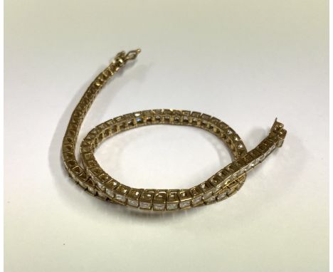 A 9ct gold CZ tennis bracelet, 7.12g (A)