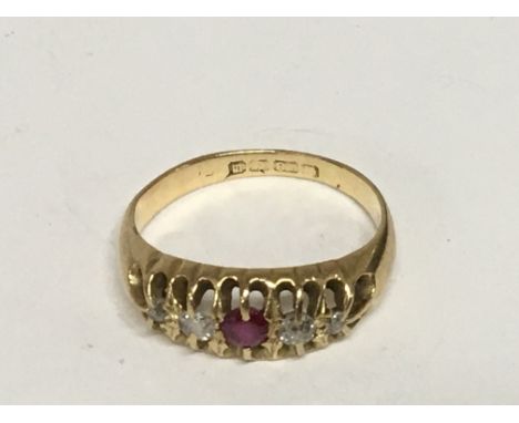 An 18carat gold ring set with ruby and diamonds weight 4g