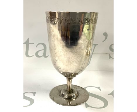 An unmarked early silver chalice (tested) with engraved border. 13cm. (Total weight 192g)