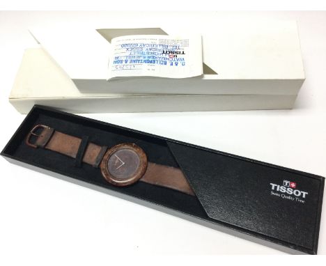 A boxed Tissot Wood Watch, brought in 1993. Postage category B