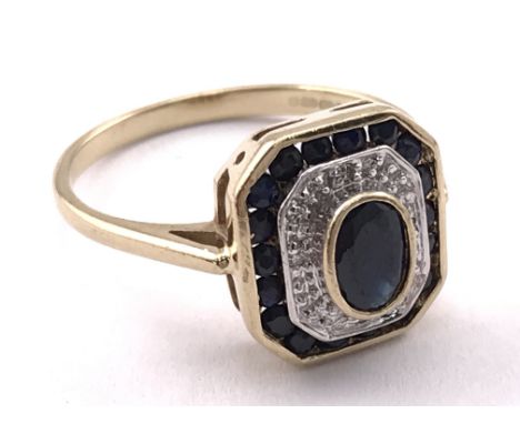 A 9 carat gold art deco ring inset with black sapphires and diamonds, ring size R. 3.13g total weight. Postage category A