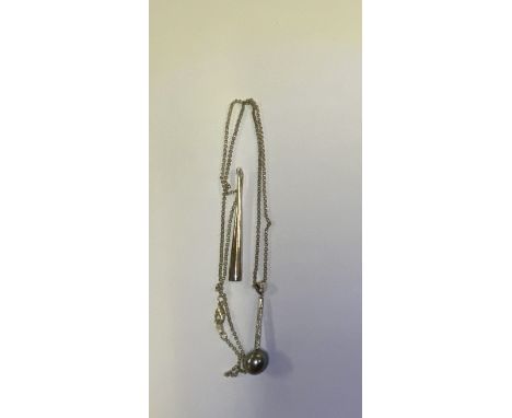 A sterling silver and black Tahitian pearl pendant together with an additional silver pendant. (A)