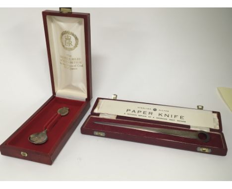 A cased silver paper knife and a silver Jubilee commemorative spoon (2)