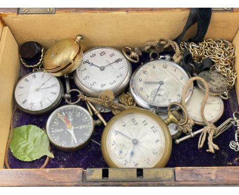 A box of interesting items to include silver watches, compass etc. Postage category B.