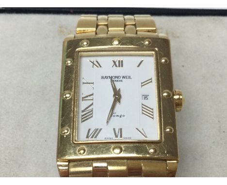 A Raymond Weil white dial tango gold plated watch. Come with box. Postage B