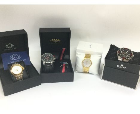 A collection of boxed watches including a Rotary 50 metres , two shillings coinwatch, Skagen, Bulova Marine Star. Postage cat