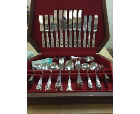 A cased canteen of kings cutlery and one other cutlery set .