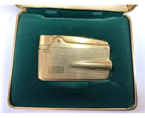 A vintage Ronson Varaflame Adonis 9ct gold sheathed lighter. (A)