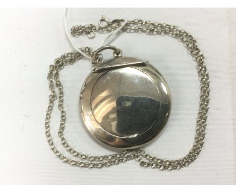 A silver locket / compact, Birmingham hallmarks. Shipping category A.