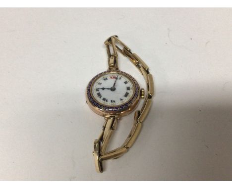 A Vintage 9carat gold ladies watch with an expanding Rolled Gold strap bracelet not seen working