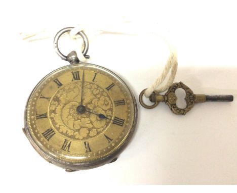 A silver cased key wind pocket watch with an elaborate dial. Seen working