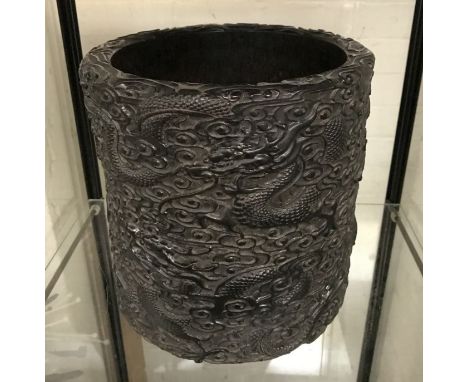 A LARGE ZITAN CHINESE BRUSH POT / SCROLL HOLDERWITH FINELY CARVED DECORATION DEPICTING DRAGONS AND SCROLLING CLOUDS,ALL IN LO