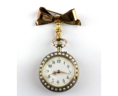 A silver and rose gilt (worn stamp) open face pocket watch set with split pearls and decorated with fleur de lys pattern enam