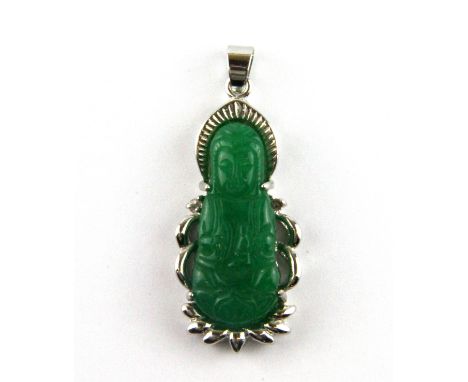 A 18ct white gold plate mounted carved green jade pendant of the goddess Guanyin, L. 4.5cm.
