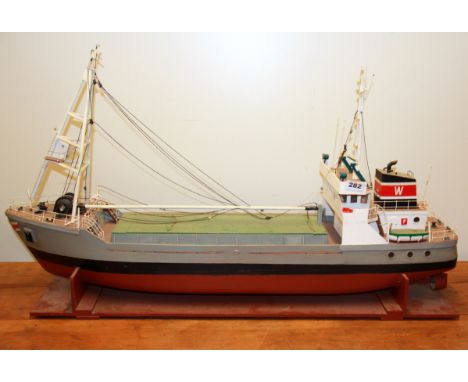 A large motorised wooden model ship, L. 95cm.