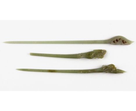 Three 19th/ 20th Century Chinese carved nephrite jade hair ornaments, longest L. 19.5cm. One A/F