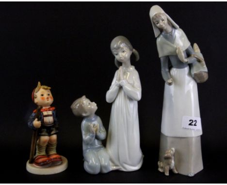 A Lladro porcelain figure of a girl with a puppy, together with a Lladro porcelain figure of a girl with two children (A/F) a