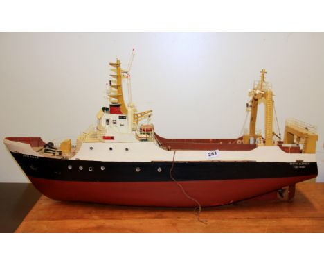 A large motorised wooden model ship, L. 90cm.