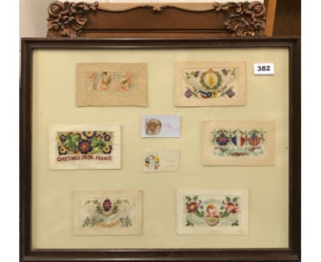 A framed group of First World War silk postcards and a gilt framed print of Disraeli.