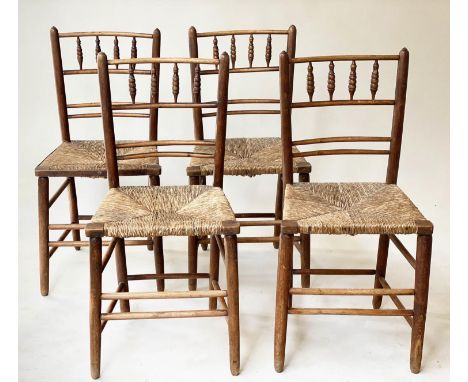COUNTRY CHAIRS, a set of four, 19th century English ash and elm with bobbin turned spindle bar backs and rush seats. (4) 